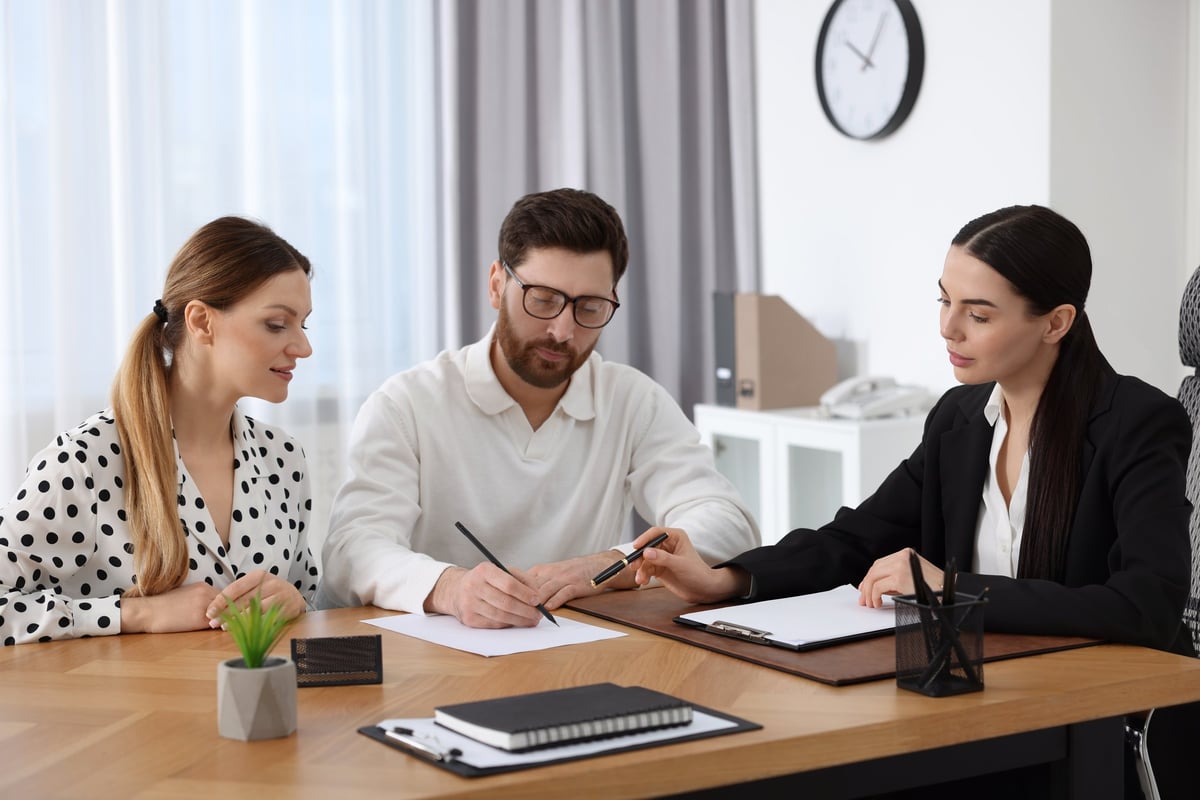 International couple consulting with immigration lawyer for Turkish citizenship through marriage application and spouse naturalization